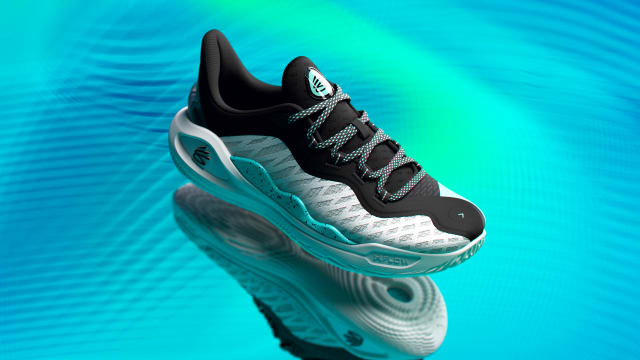 A detailed look at Stephen Curry's white and black Under Armour basketball shoes.